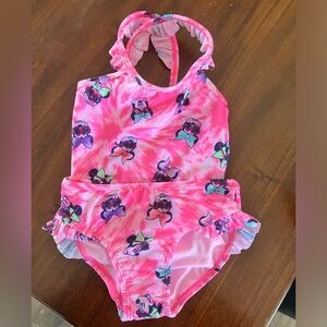 NWT 2 piece Minnie Mouse swimsuit.